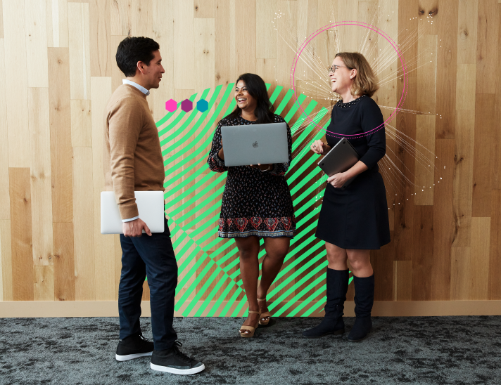 Diverse New Relic employees standing and chatting