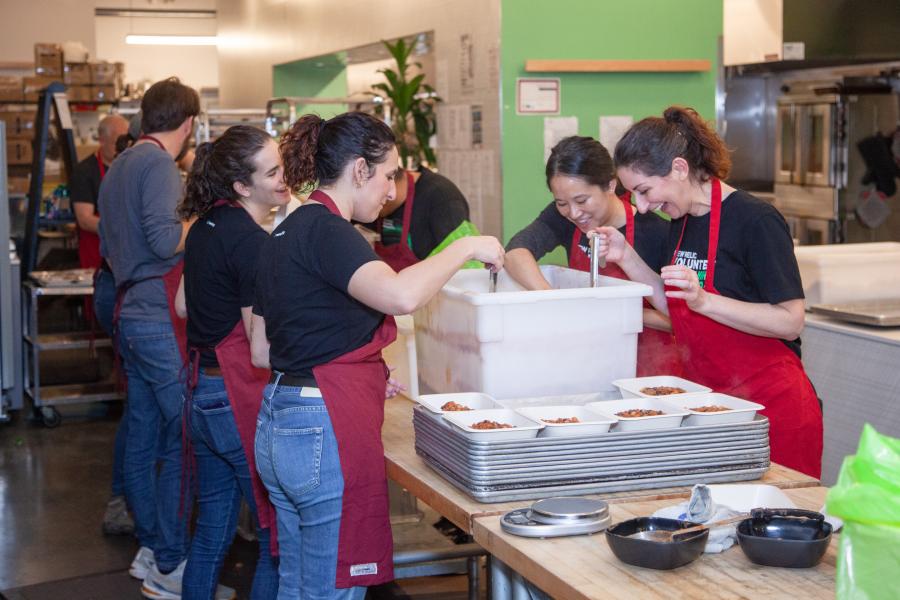 Relics volunteering at a food kitchen 